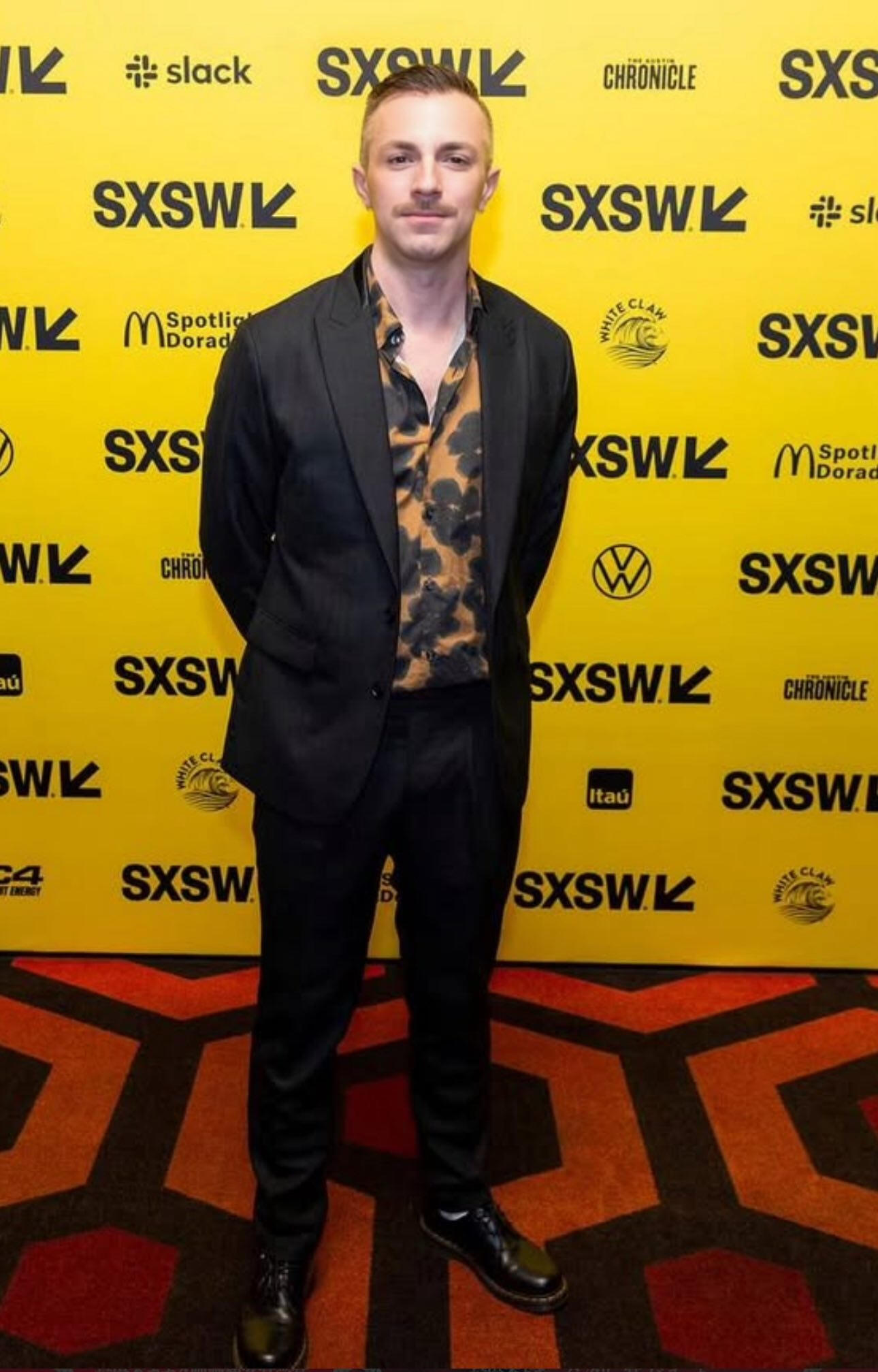 sean-horlor-filmmaker-directorsxsw Sean Horlor, a Vancouver-based filmmaker and film director, photographed on the red carpet at the SXSW Film Festival world premiere of Satan Wants You in 2023. Photo by Kaitlyn Kilpatrick / SXSW.